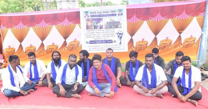 A sit-in demanding the vacation of Rathabidi