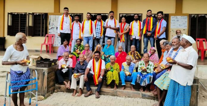 T.A. Fruit-milk distribution on the occasion of Narayana Gowda's birthday