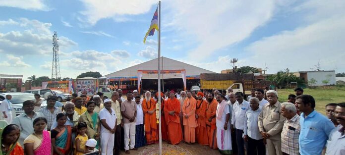 Hoisting of Panchacharya flag on Sri Annadaneshwar High School grounds